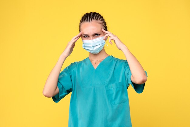 Front view female doctor in medical shirt and mask, medic health nurse virus pandemic covid-