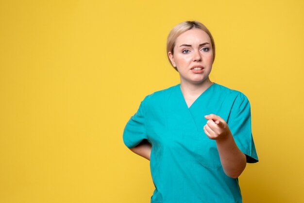 Front view female doctor in medical shirt, medic emotion hospital covid pandemic nurse