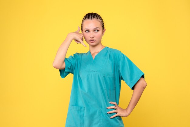 Front view female doctor in medical shirt, nurse virus covid-19 hospital health