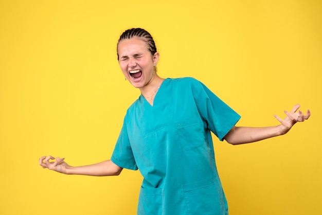 Front view female doctor in medical shirt screaming, health nurse hospital covid-19 virus color