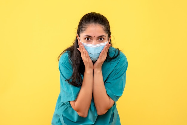 Front view female doctor putting hands