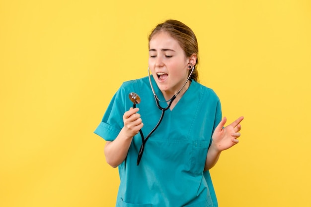 Free photo front view of female doctor with stethoscope