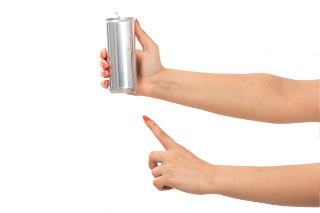 Free photo a front view female hand holding silver can showing finger on the white