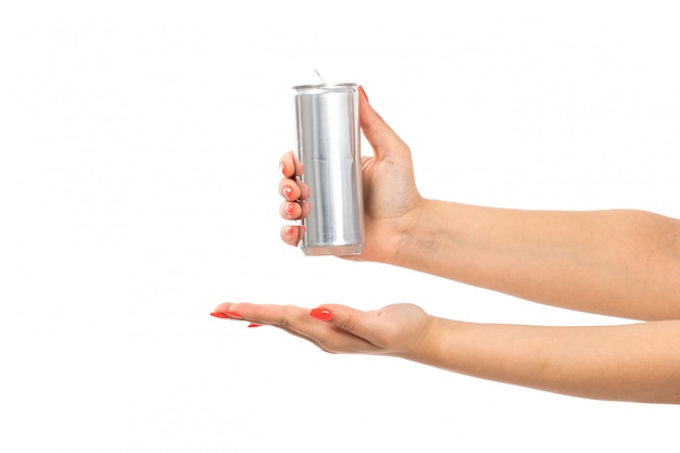 A front view female hand holding silver can showing open palm on the white