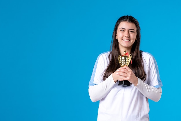 Front view female player with trophy