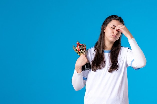 Front view female player with trophy