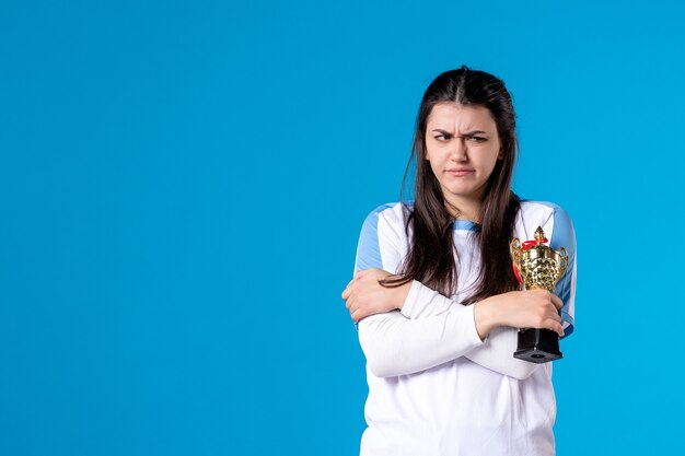 Front view female player with trophy