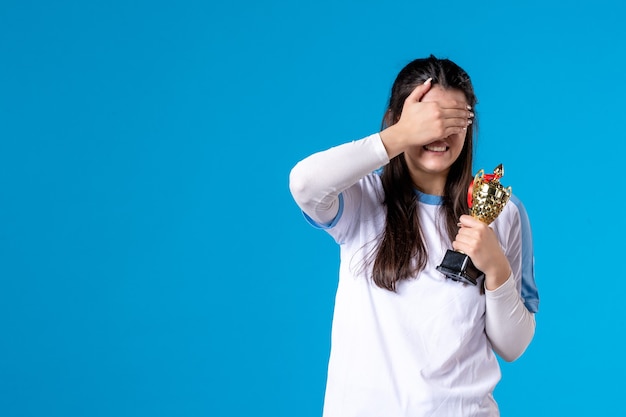 Front view female player with trophy