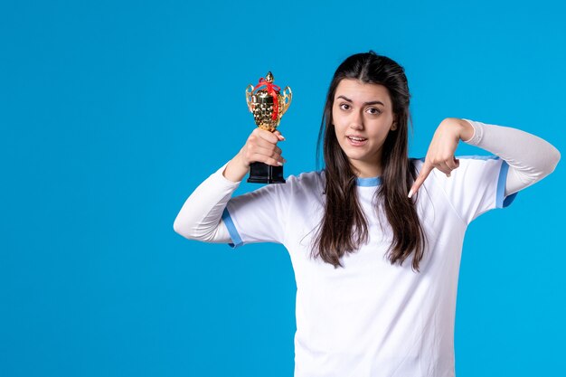 Front view female player with trophy