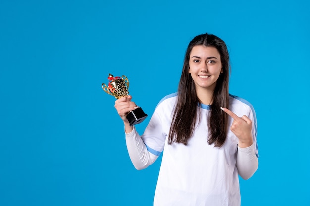 Front view female player with trophy