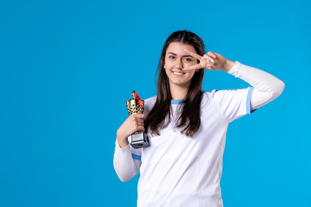 Front view female player with trophy