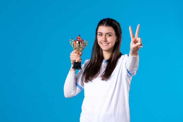 Front view female player with trophy