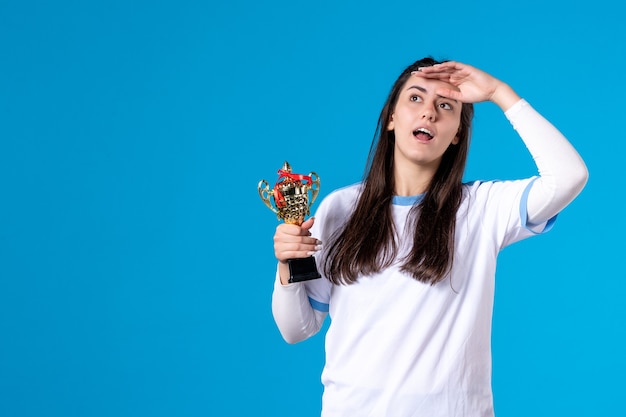 Front view female player with trophy