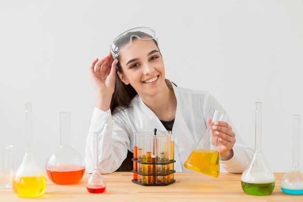 Front view of female scientist with potions