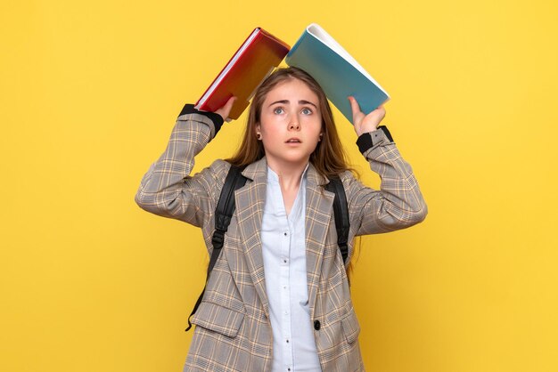 Front view of female student with files