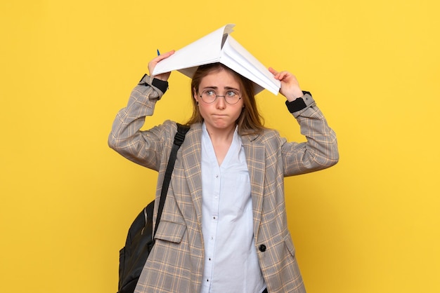 Free photo front view of female student with files