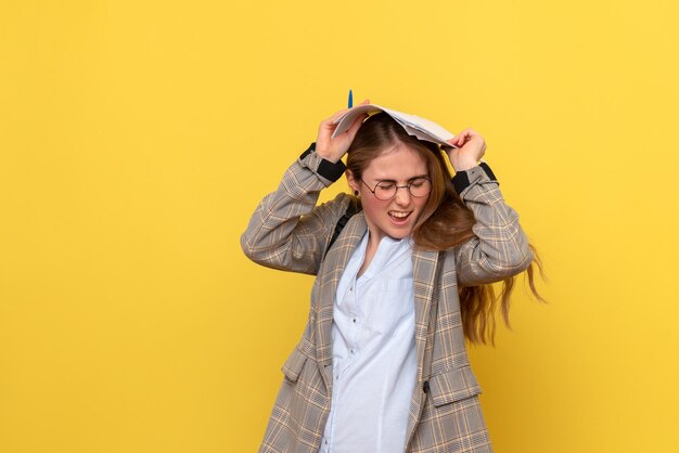 Front view of female student with files