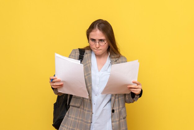 Front view of female student with files