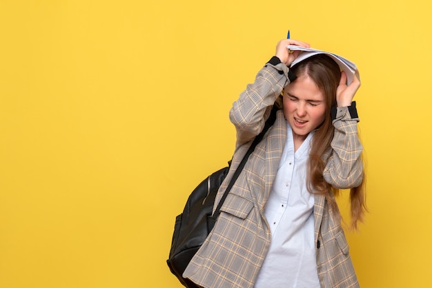 Front view of female student with papers