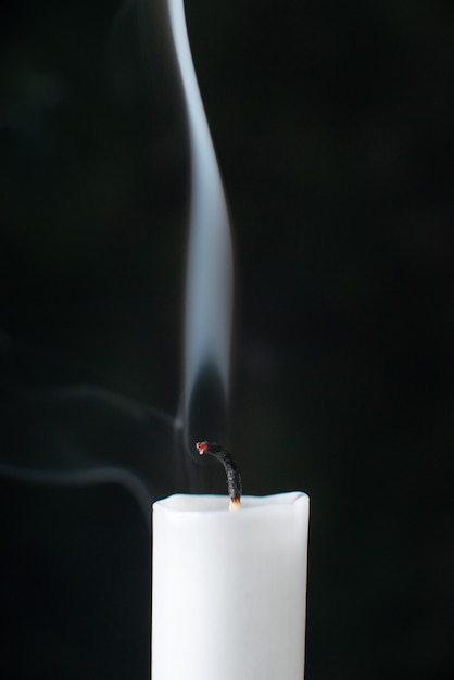 Front view of fireless candle on black