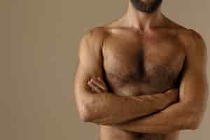 Free photo front view fit man with chest hair