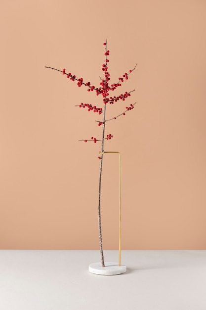 Free photo front view of flower decor on a marble stand