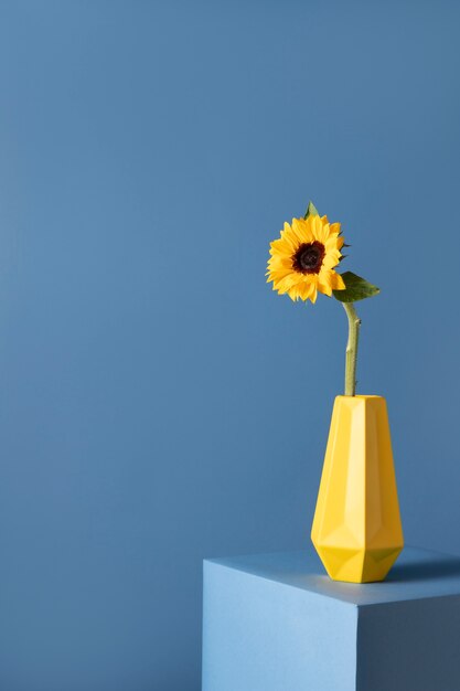 Front view of flower decor in a vase with copy space