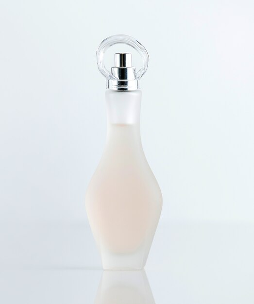 Download Free Photo A Front View Black Fragrance Bottle With Yellow Design Isolated On The White Wall PSD Mockup Templates