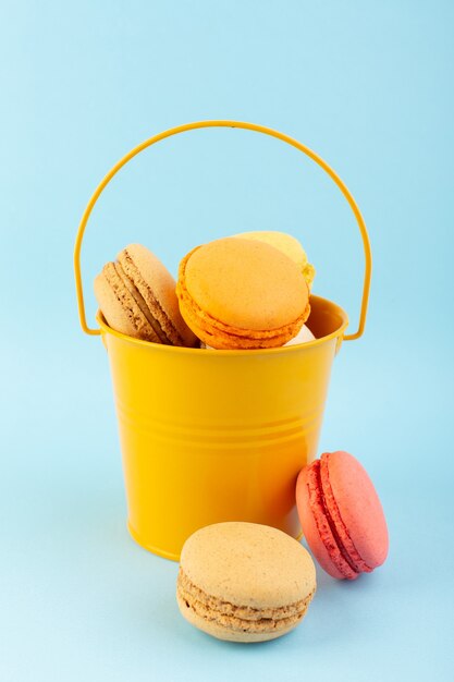 a front view french macarons delicious and baked inside basket
