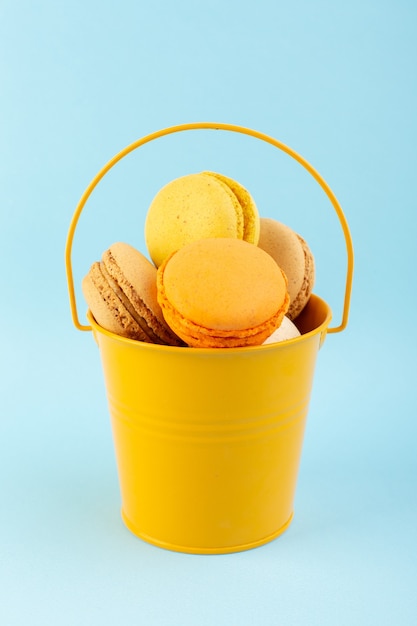 A front view french macarons delicious and baked inside basket