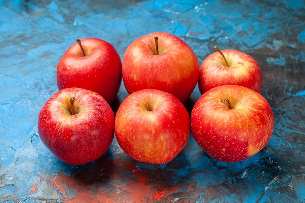 Front view fresh apples on blue background ripe mellow color  health diet