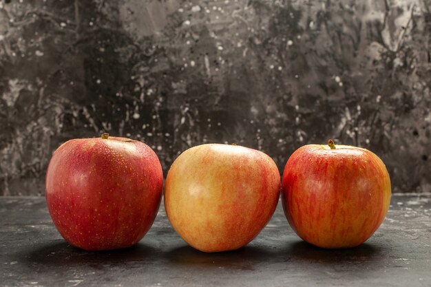 Front view fresh apples lined on dark photo fruit ripe vitamine tree mellow juice color