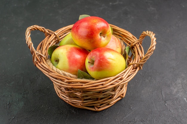 Front view fresh apples ripe fruits inside basket on grey table tree fruit fresh ripe