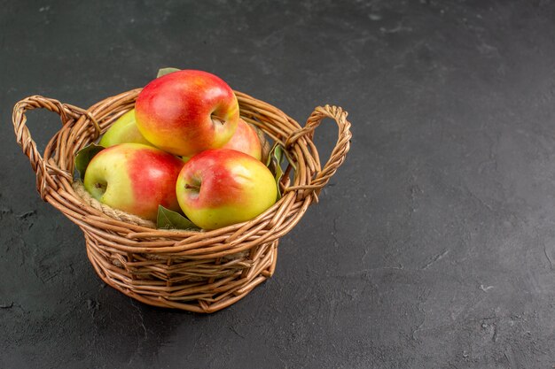 Front view fresh apples ripe fruits inside basket on grey table tree fruit fresh