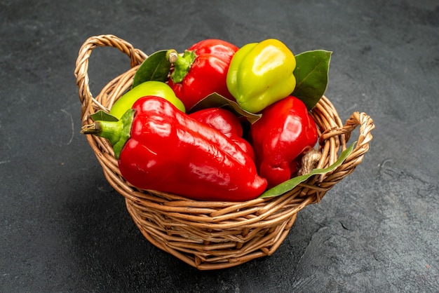 Front view fresh bell-peppers inside basket