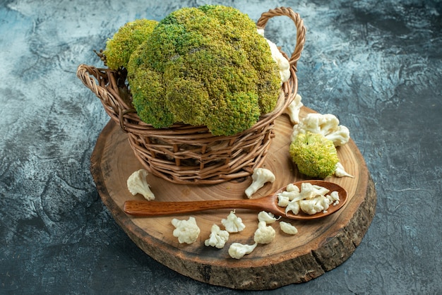 Front view fresh cauliflower inside basket on light-grey surface