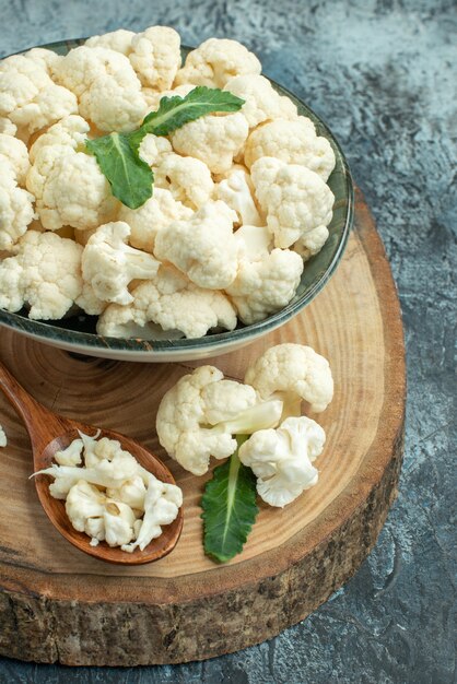 Front view fresh cauliflower inside plate on light-grey surface