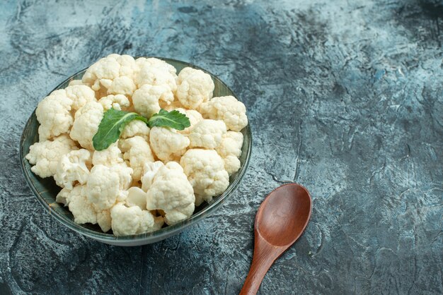 Front view fresh cauliflower inside plate on light-grey surface