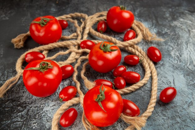 Front view fresh cherry tomatoes with ropes