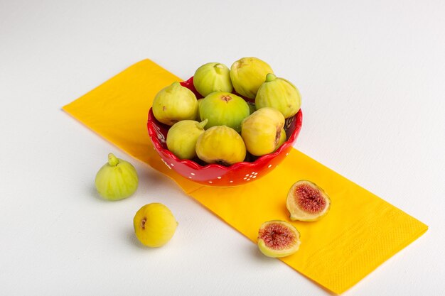 Front view fresh figs sweet and delicious fetuses inside red plate on white surface