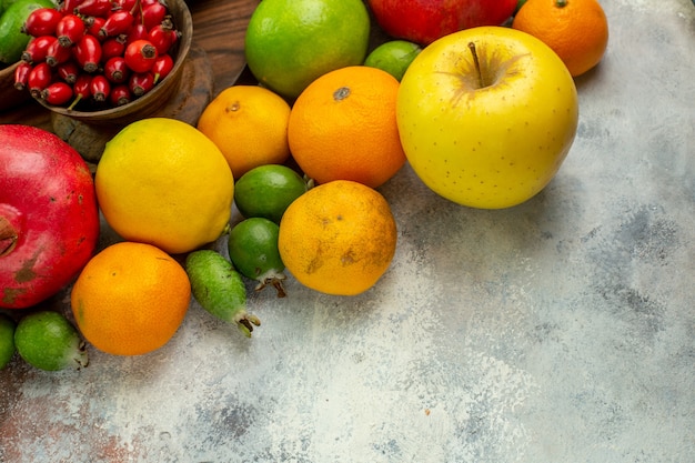 Front view fresh fruits different ripe and mellow fruits on white background berry tasty health color diet