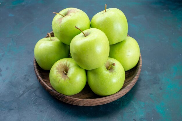 Front view fresh green apples on dark-blue surface fresh fruit mellow plant tree