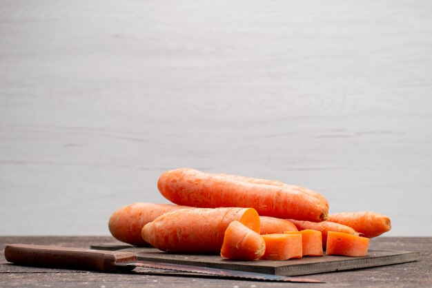 Front view fresh orange carrot ripe on grey