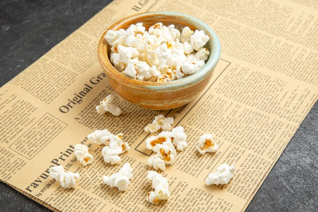 Front view fresh popcorn inside plate on dark background snack movie cinema food corn