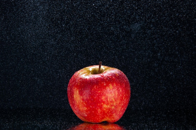 Front view fresh red apple on dark black background color ripe mellow tree exotic tasty darkness photo pear