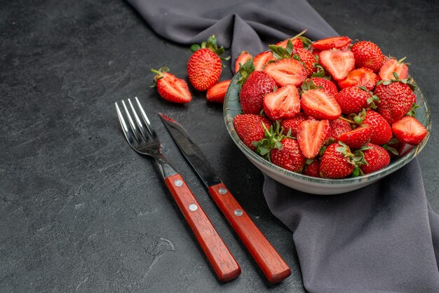 Front view fresh red strawberries inside plate on dark background color wild berry summer juice tree