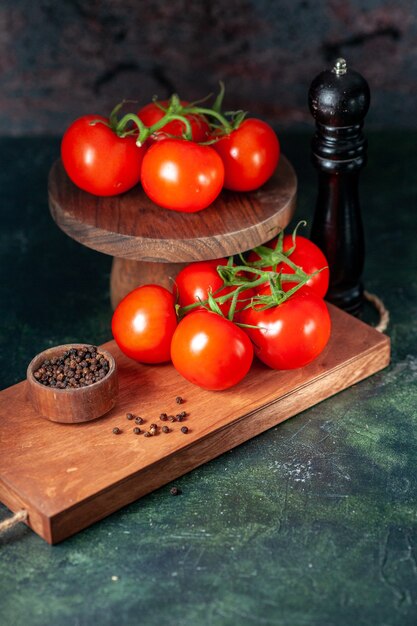 front view fresh red tomatoes on dark background