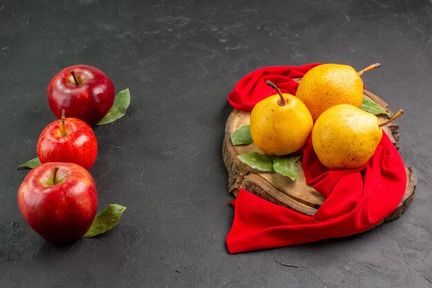 Front view fresh sweet pears with apples on a grey table red ripe fresh mellow tree