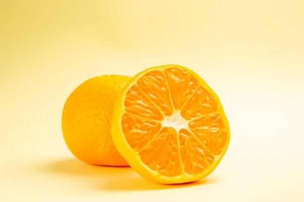 Front view fresh tangerines on the white table