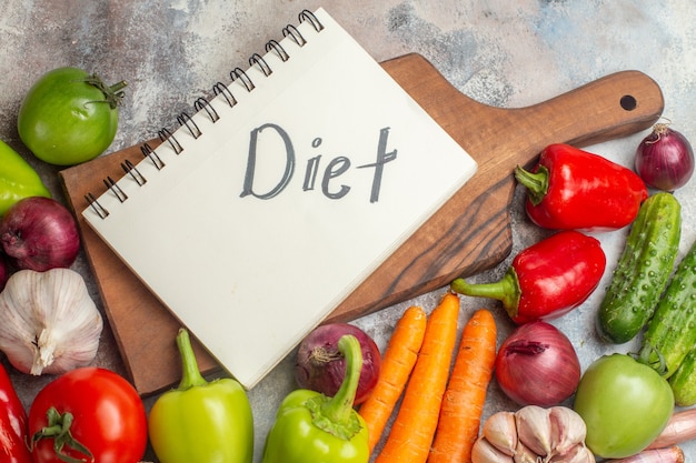 Front view fresh vegetables composition on the white background meal color healthy life ripe diet salad